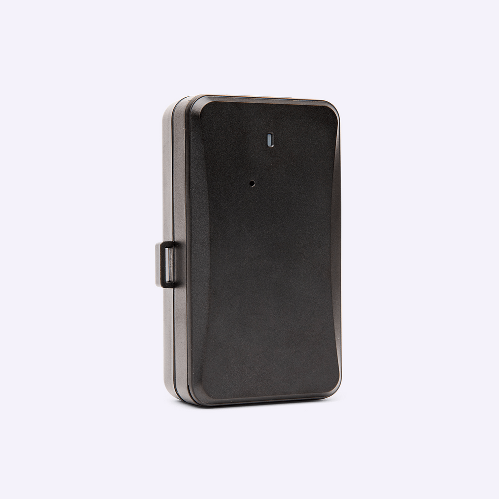 Compact black GPS tracking device with durable casing, shown standing upright on a light background.
