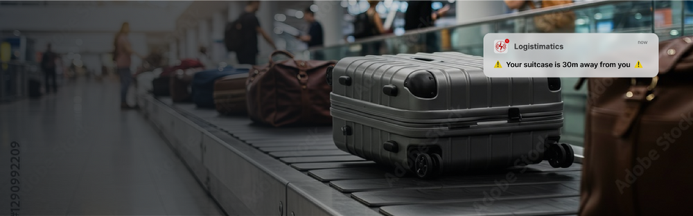 Suitcase on airport baggage claim carousel with Logistimatics mobile alert showing luggage location 30 meters away.