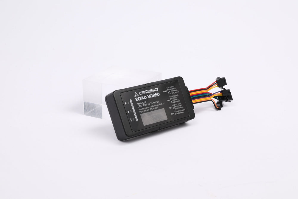 Black GPS device with wires on a white background