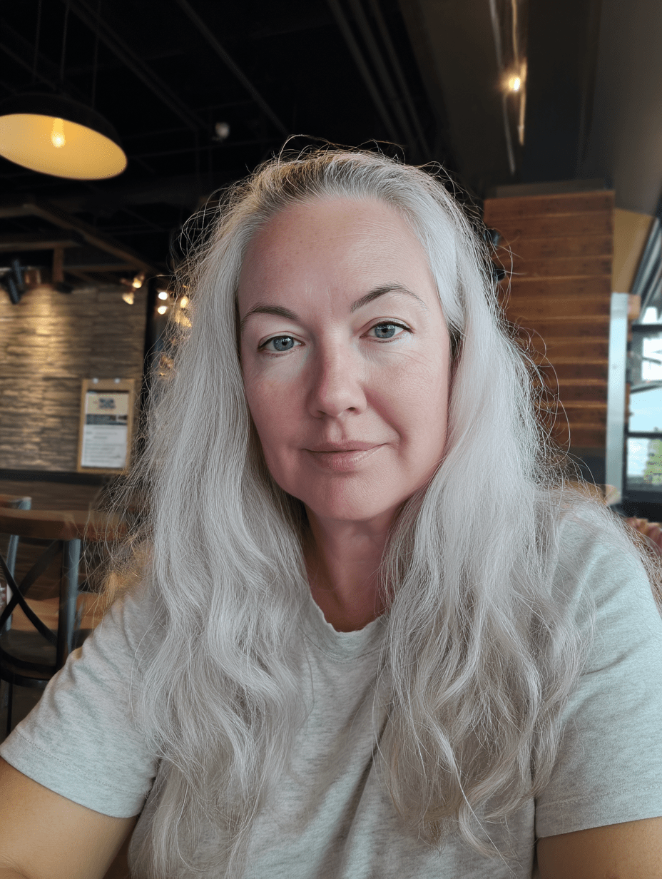 Woman with long white hair in a casual setting