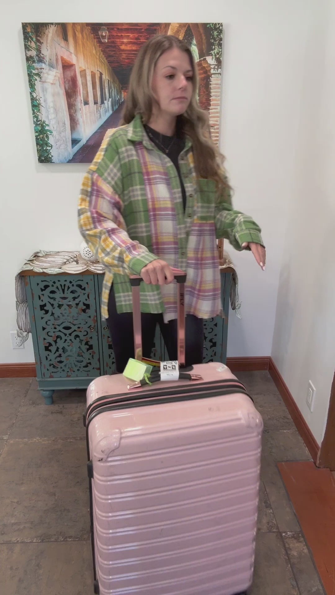 Video featuring a traveler with a suitcase, suggesting content about how GPS tracking devices can help prevent lost luggage and provide peace of mind during travel.