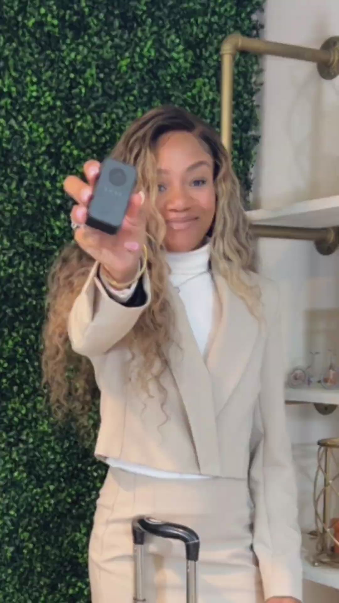 Video featuring a traveler with suitcases at an airport, suggesting a comparison of GPS tracking devices and AirTags for enhancing luggage security and tracking during journeys.